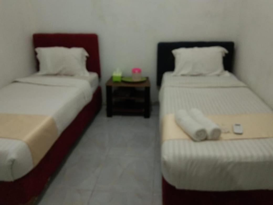 Hotel Krui Syariah Buitenkant foto