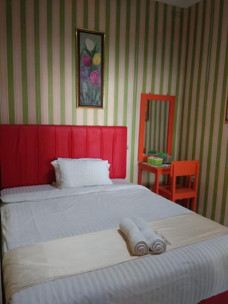 Hotel Krui Syariah Buitenkant foto