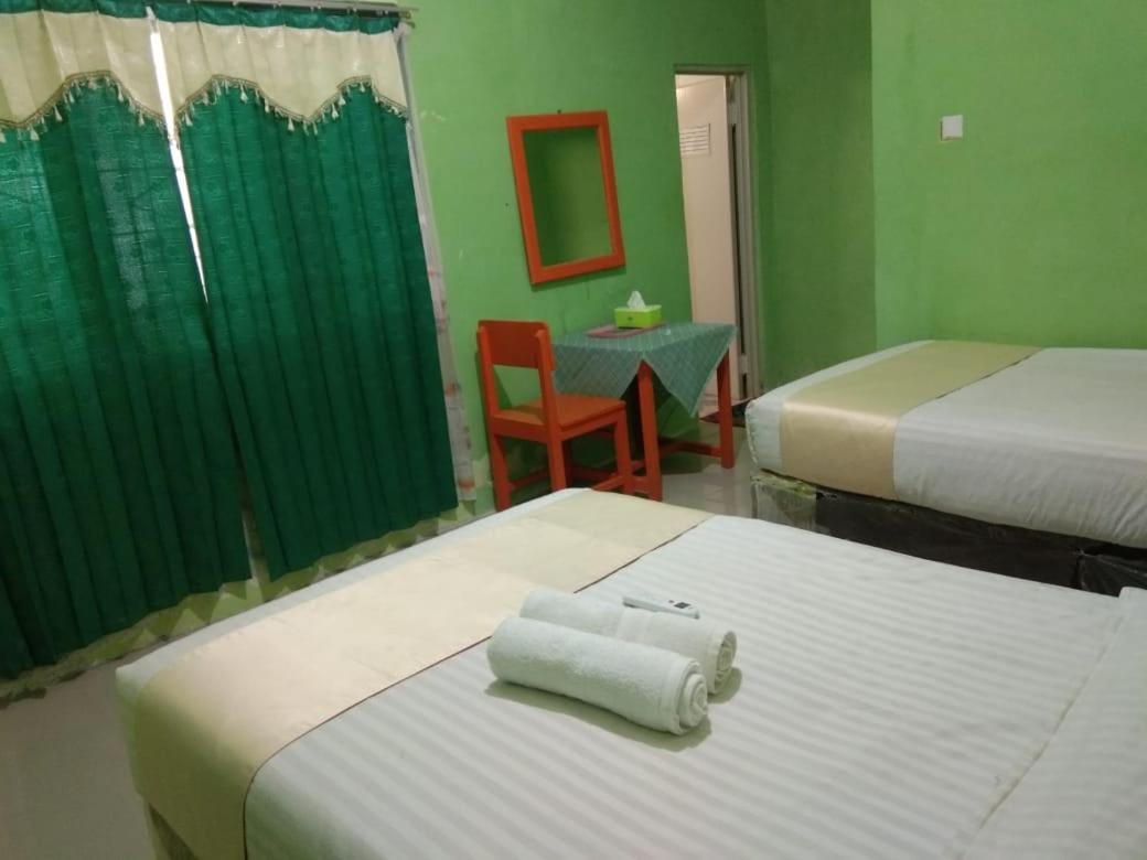 Hotel Krui Syariah Buitenkant foto