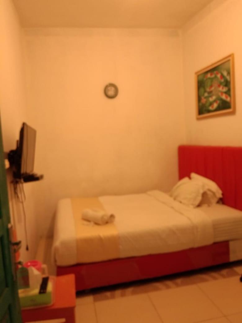 Hotel Krui Syariah Buitenkant foto
